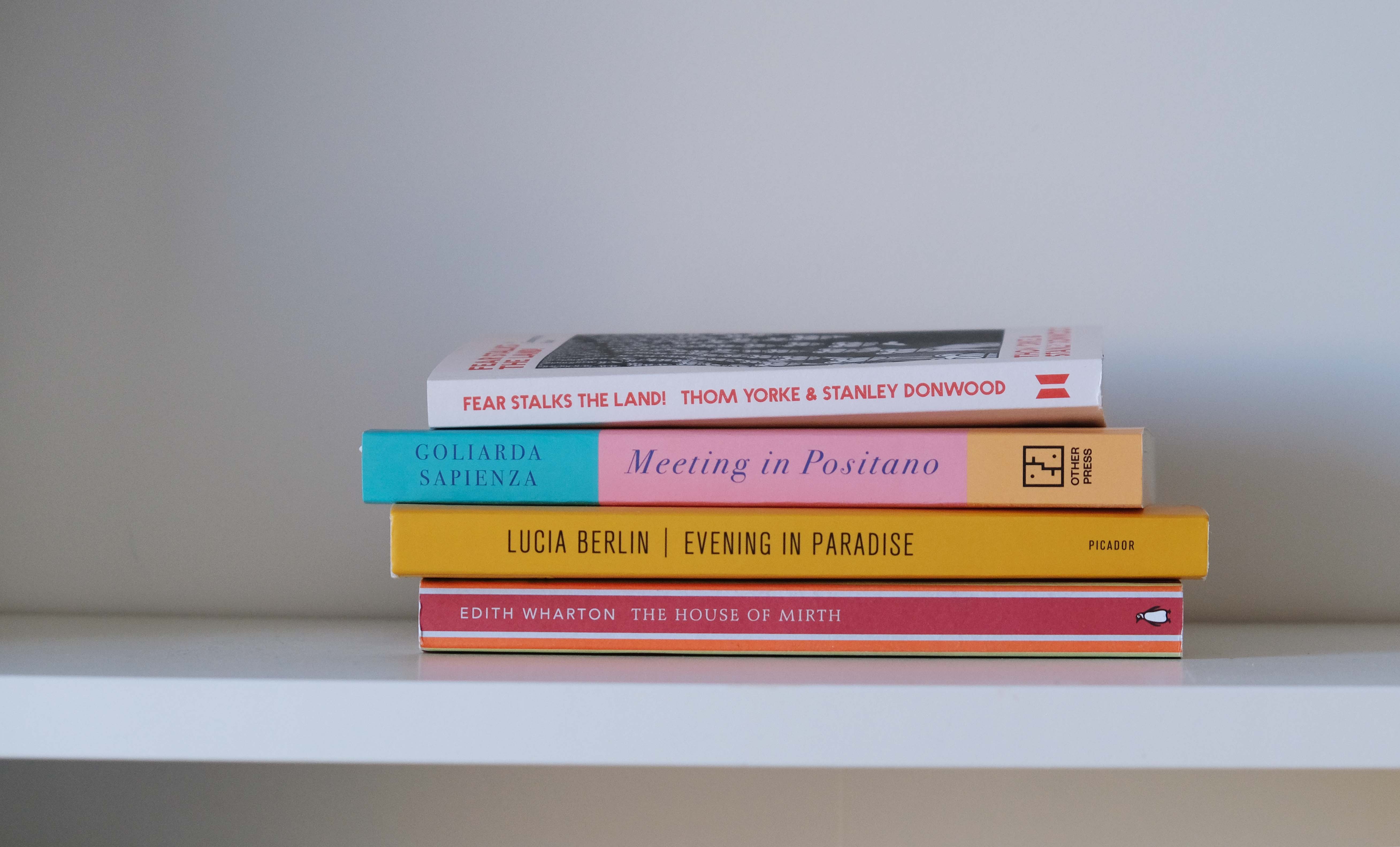 A pile of books on a table