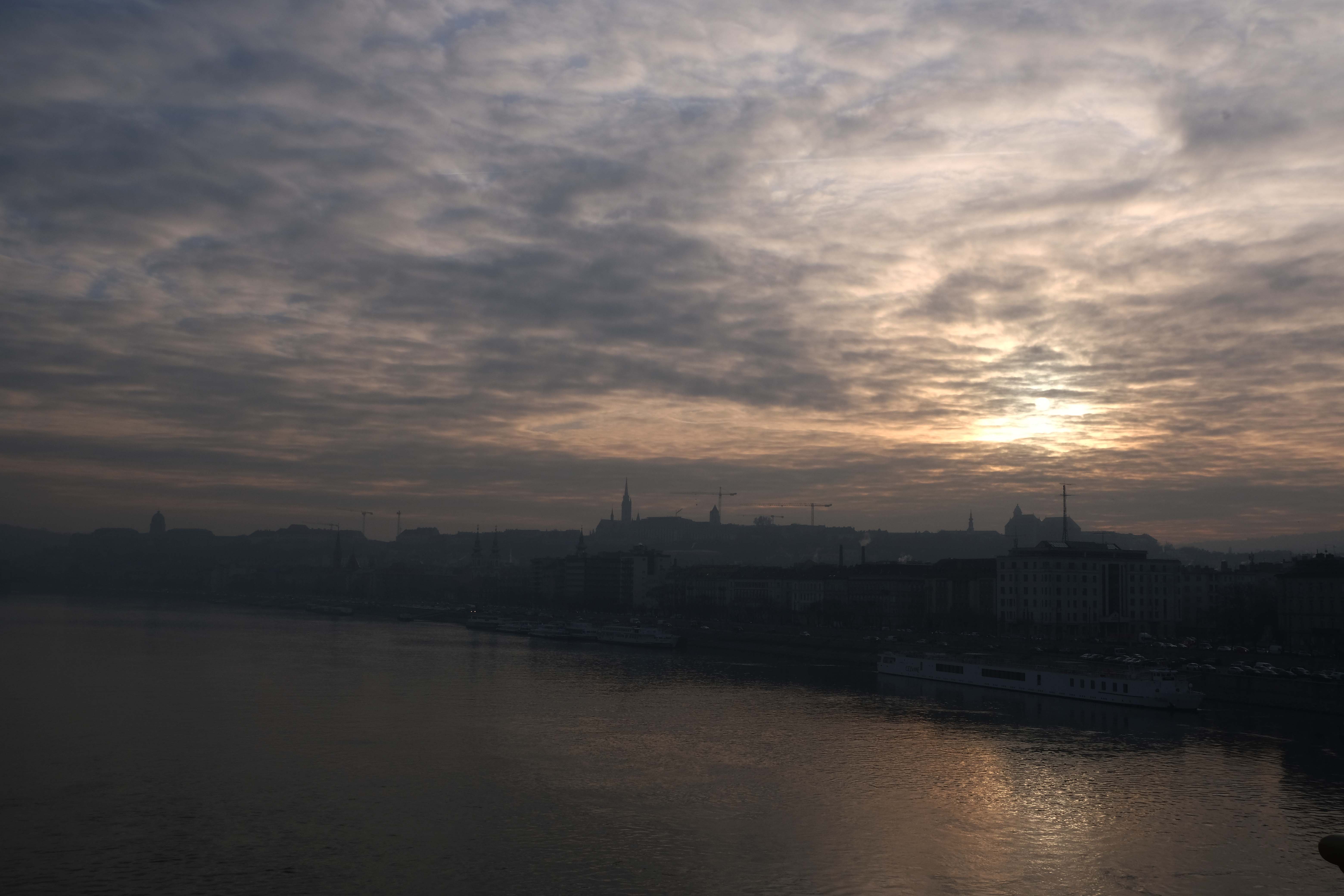 Wintry afternoon in Budapest, sun above the buildings